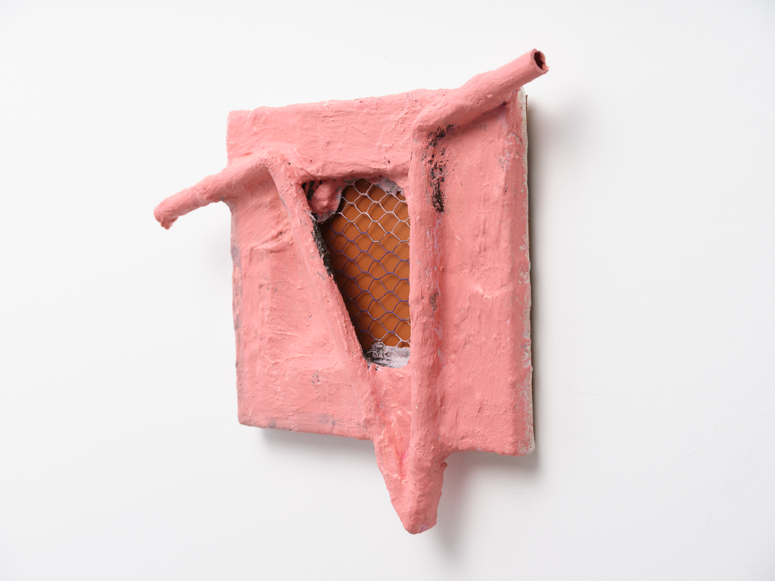 Sculptural painting by Rachel Walters in Plaster bandage, plumbers pipe, chicken wire, leather and oil on stretcher titled Front