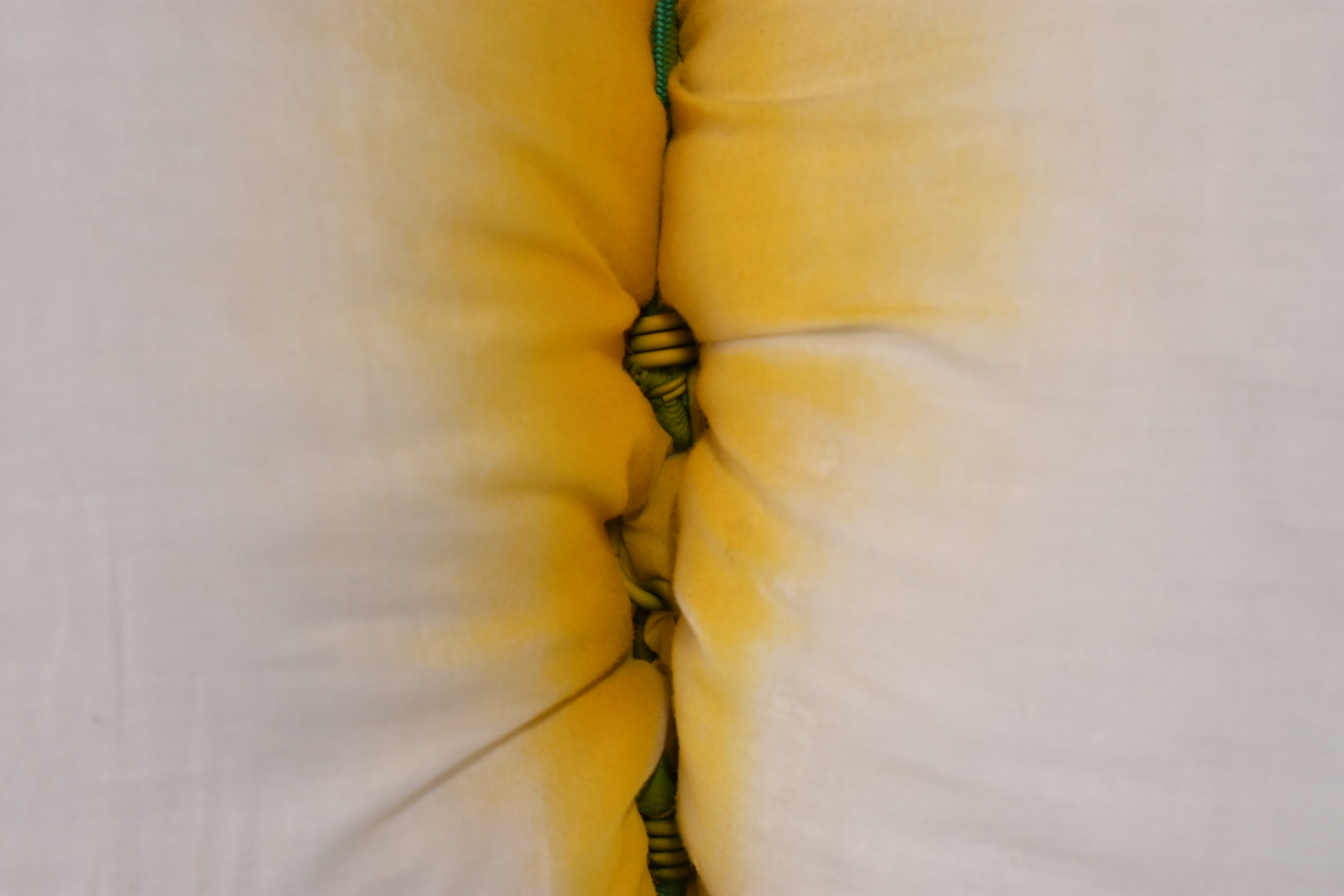 Sculpture by Rachel Walters- canvas, pillow, bungee cord, spray paint and golden earrings